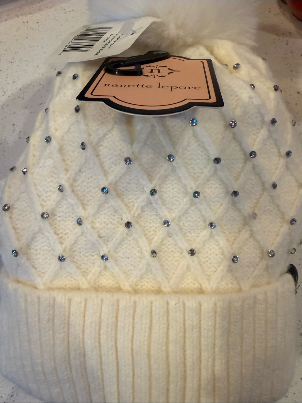 Nanette Lepore Cream Knit Pom-Pom Beanie with Rhinestones
